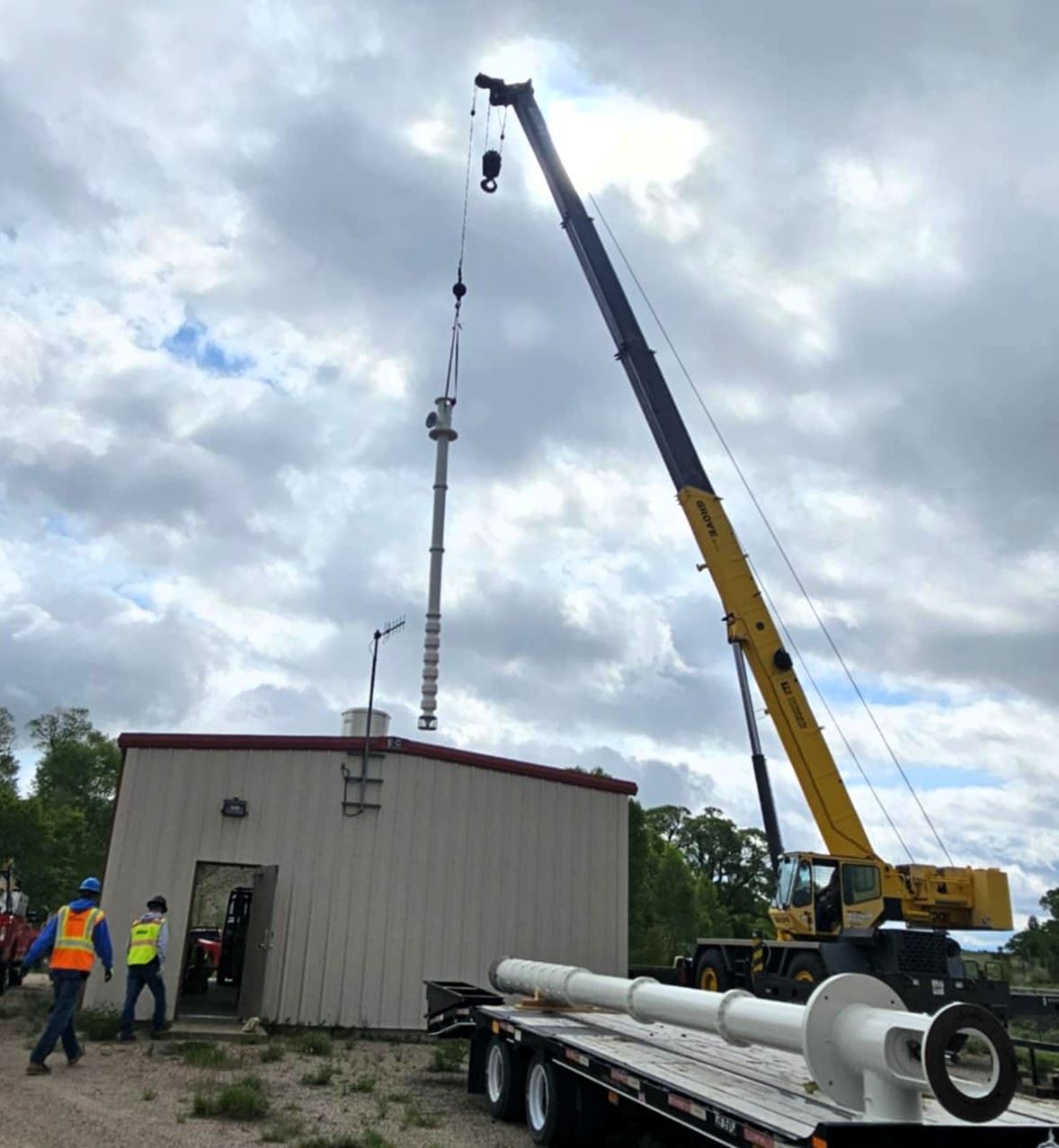 River Pump Being Lowered Into Building